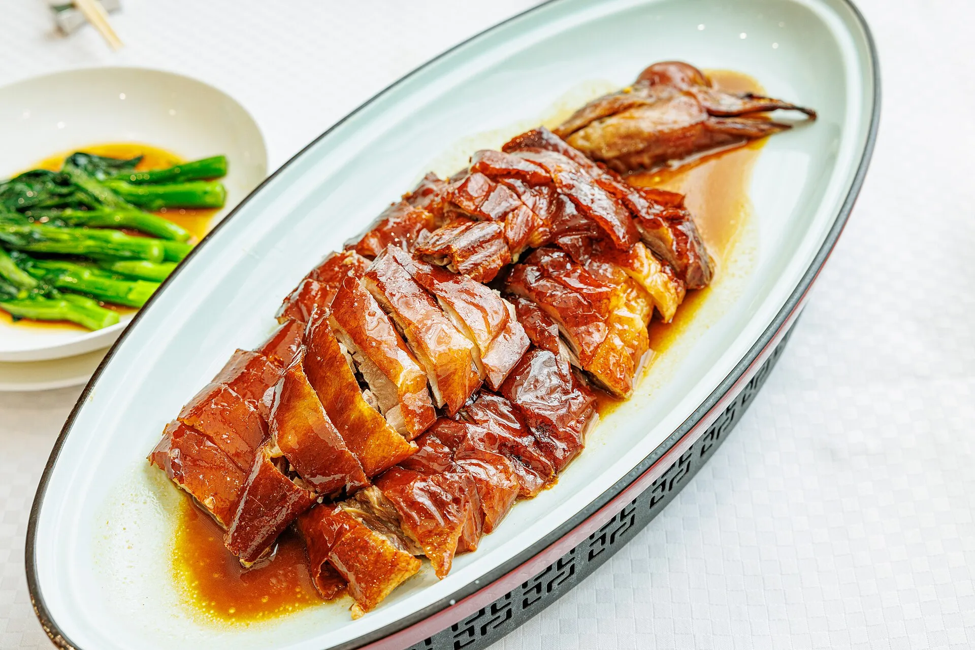A platter of chopped Cantonese roast goose with crisp lacquered skin