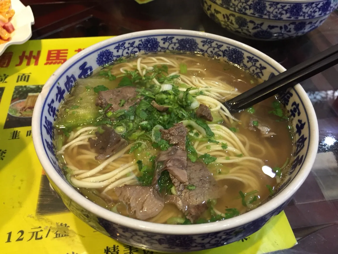 A bowl of Lanzhou hand-pulled beef noodle soup