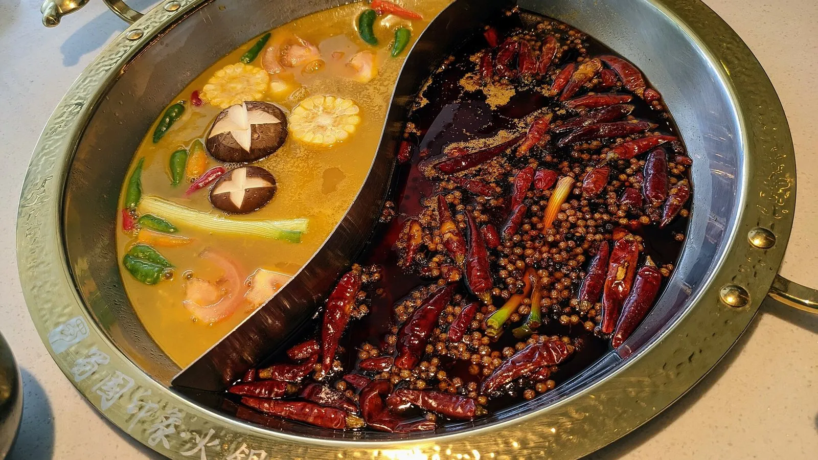 A Chengdu mandarin-duck hotpot, half spicy half mild
