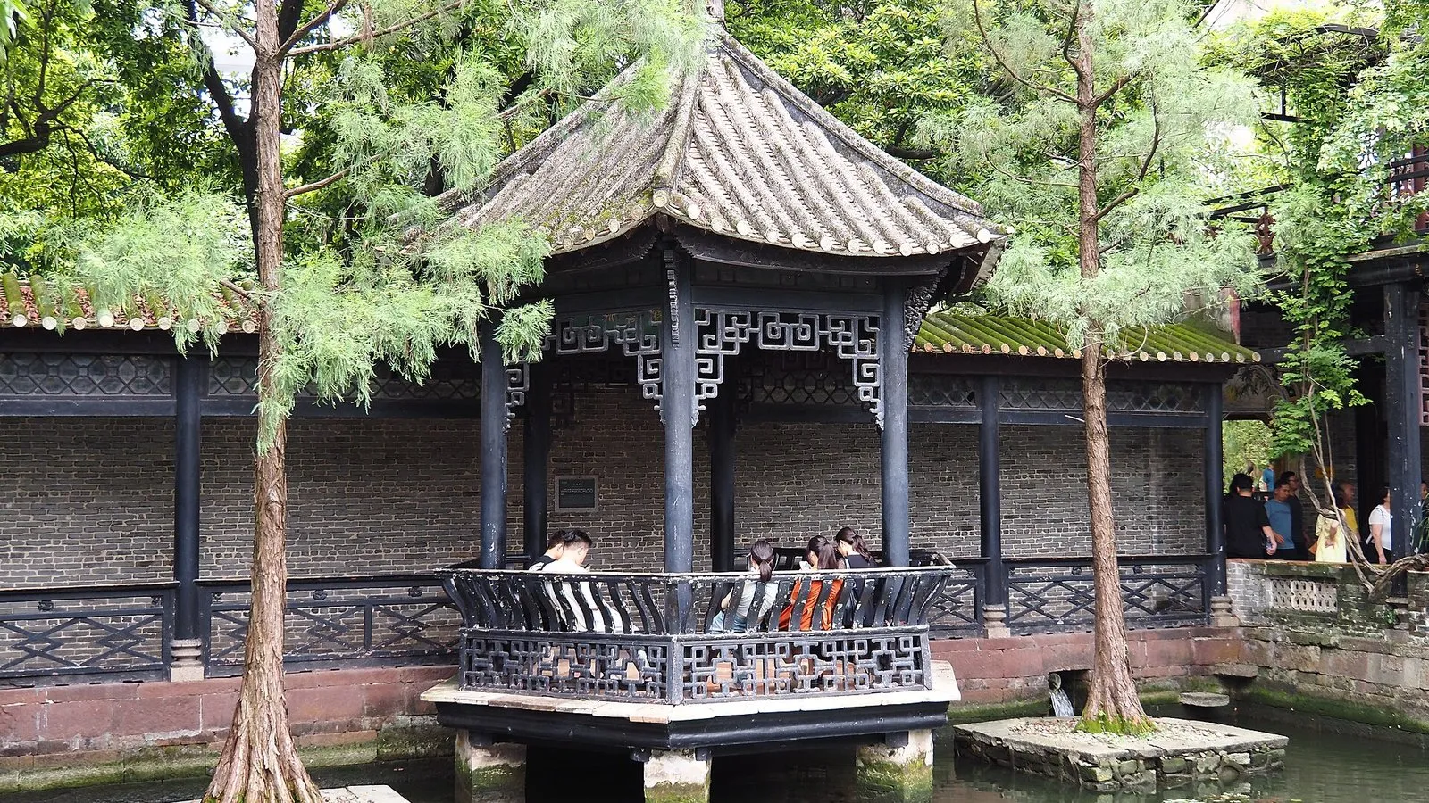 A pavilion over a lily pond at Qinghui Garden in Shunde