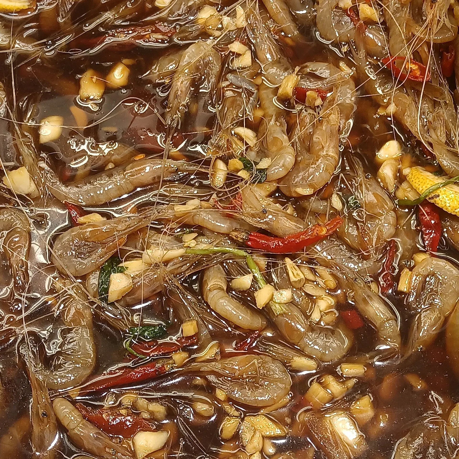 A dish of live "drunken" shrimp marinated in rice wine with chilli and garlic