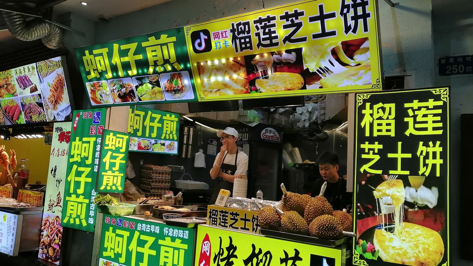An oyster omelette being cooked at a Xiamen stall