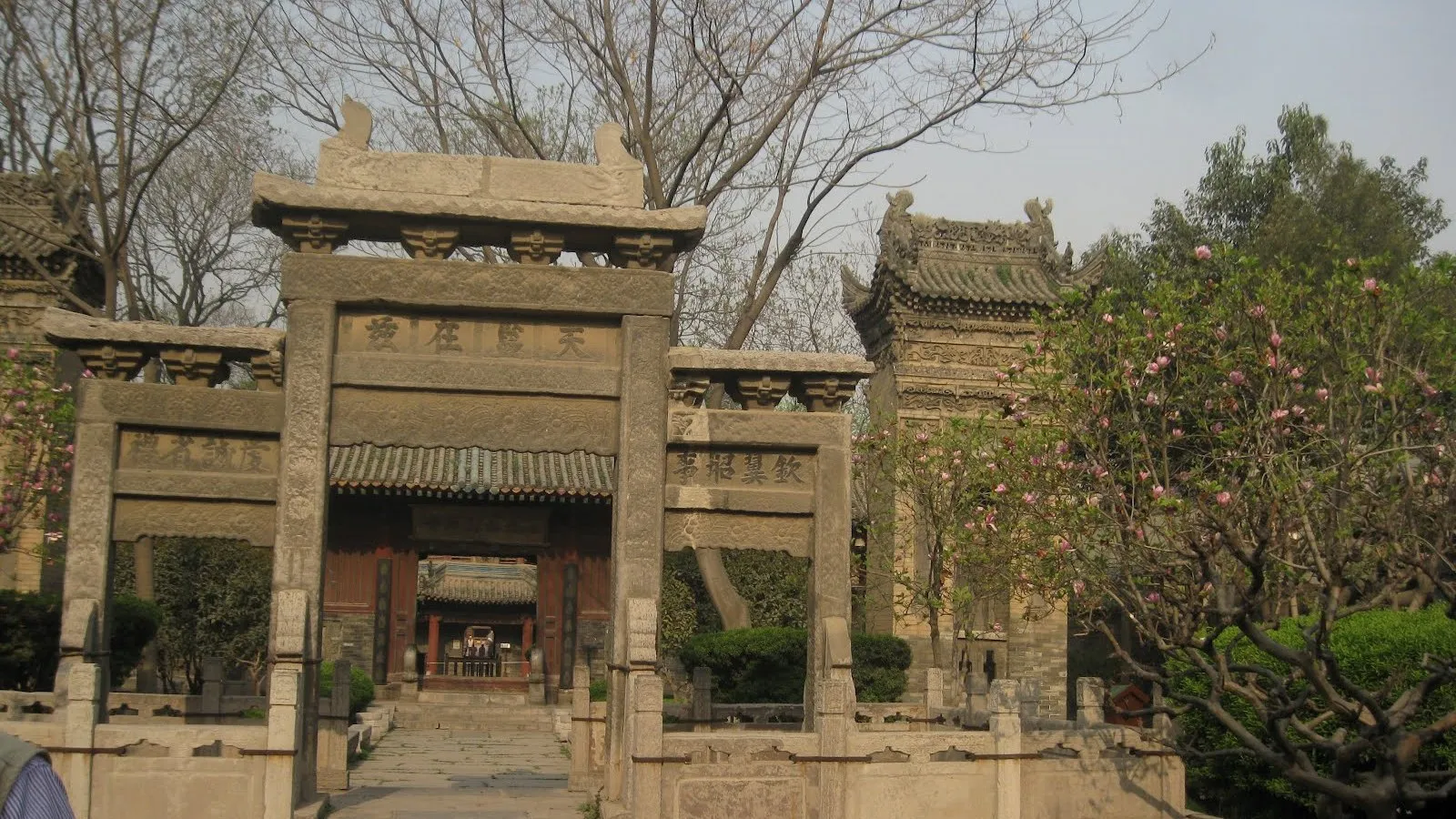 A Chinese-style stone archway and minaret at the Great Mosque of Xi'an